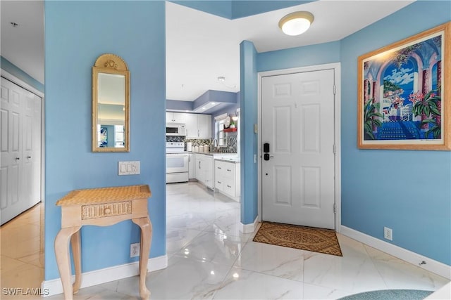 entrance foyer featuring sink