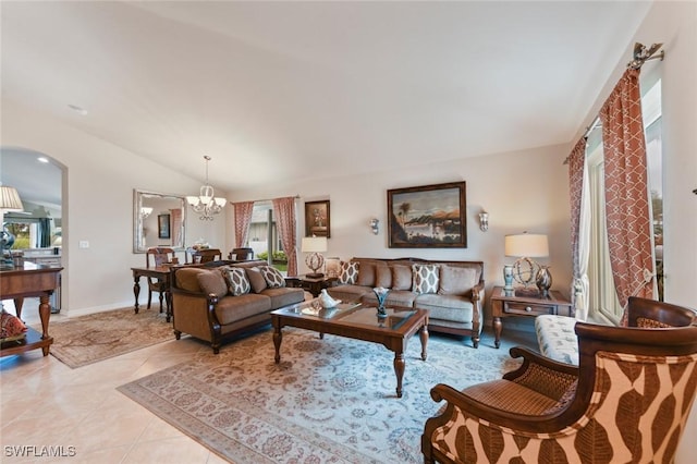 living room featuring a notable chandelier, vaulted ceiling, and light tile patterned floors