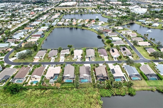 drone / aerial view with a water view