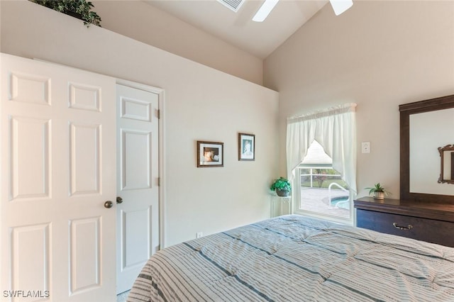 bedroom with ceiling fan and lofted ceiling