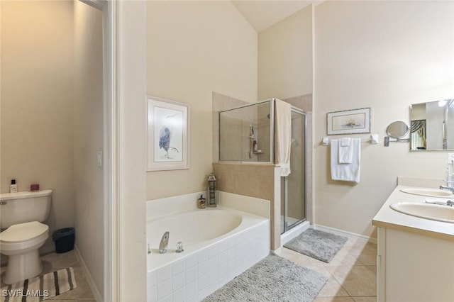 full bathroom featuring independent shower and bath, toilet, tile patterned flooring, and vanity