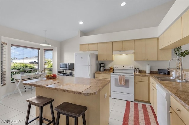 kitchen with lofted ceiling, sink, white appliances, light tile patterned flooring, and light brown cabinetry