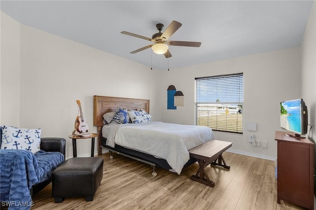 bedroom featuring ceiling fan and light wood-type flooring