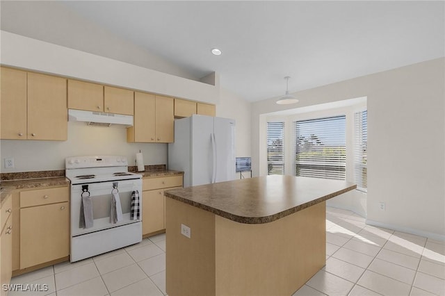 kitchen with light tile patterned floors, light brown cabinets, white appliances, vaulted ceiling, and a center island