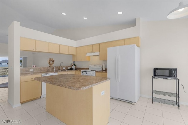 kitchen featuring a kitchen island, sink, white appliances, light brown cabinets, and light tile patterned floors