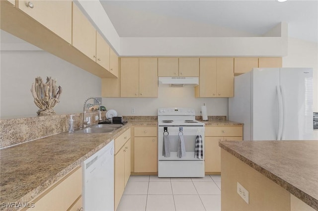 kitchen with light brown cabinetry, sink, white appliances, and light tile patterned floors