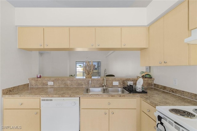 kitchen featuring sink, white appliances, and light brown cabinets