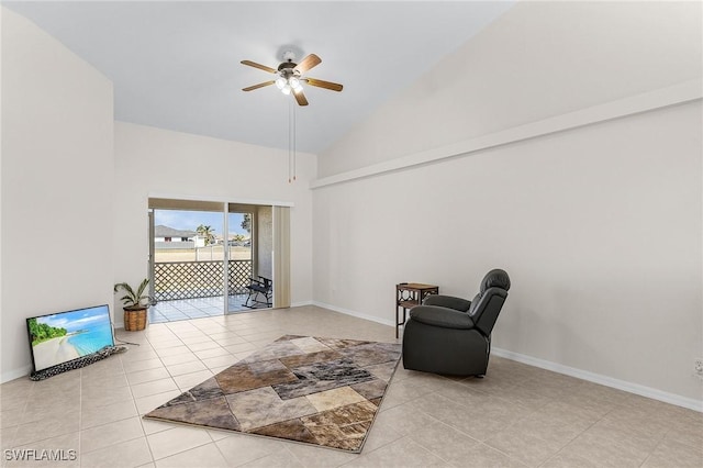 sitting room featuring ceiling fan, light tile patterned floors, and high vaulted ceiling