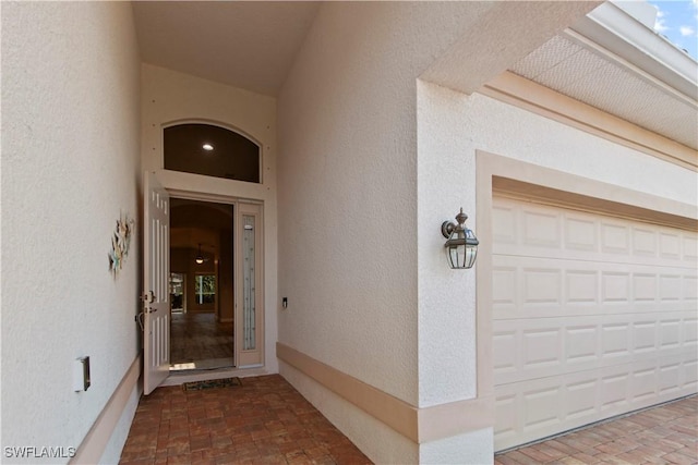 entrance to property with a garage