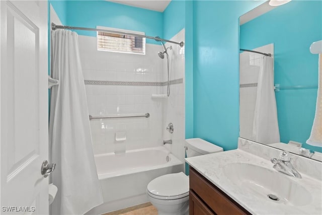 full bathroom featuring shower / tub combo, vanity, and toilet