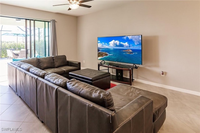 tiled living room with ceiling fan