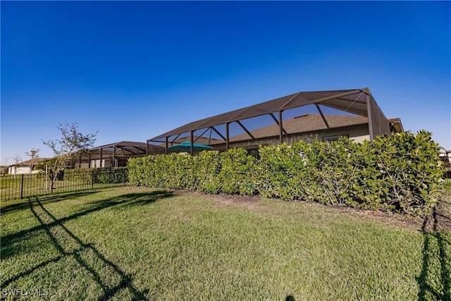 view of yard with a lanai