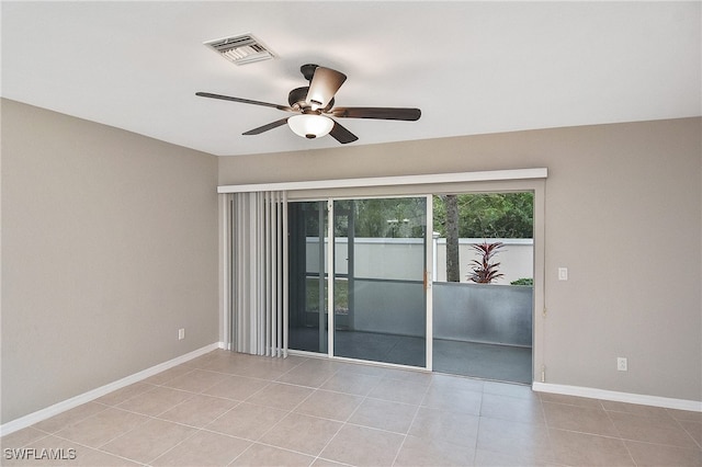 8681 Athena Ct, Lehigh Acres, FL 33971 - tiled spare room with ceiling fan and baseboards
