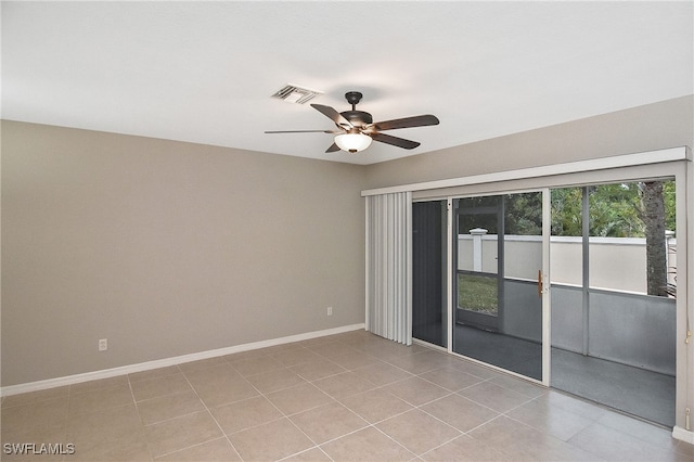 8681 Athena Ct, Lehigh Acres, FL 33971 - spare room featuring a ceiling fan, baseboards, and light tile patterned flooring