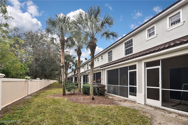 8681 Athena Ct, Lehigh Acres, FL 33971 - view of yard with a sunroom