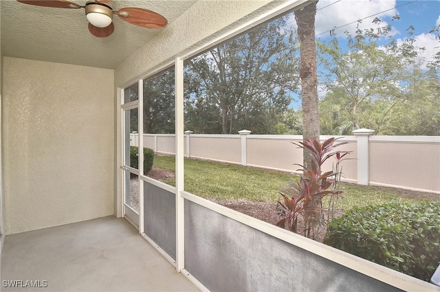8681 Athena Ct, Lehigh Acres, FL 33971 - unfurnished sunroom with ceiling fan
