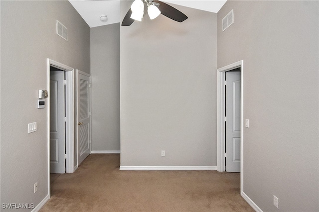 8681 Athena Ct, Lehigh Acres, FL 33971 - empty room with carpet floors, ceiling fan, baseboards, and a smoke detector