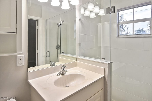8681 Athena Ct, Lehigh Acres, FL 33971 - bathroom featuring a stall shower and vanity
