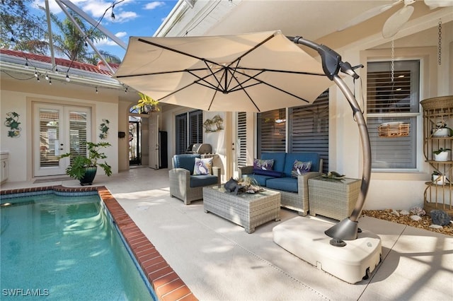 exterior space with french doors and an outdoor hangout area