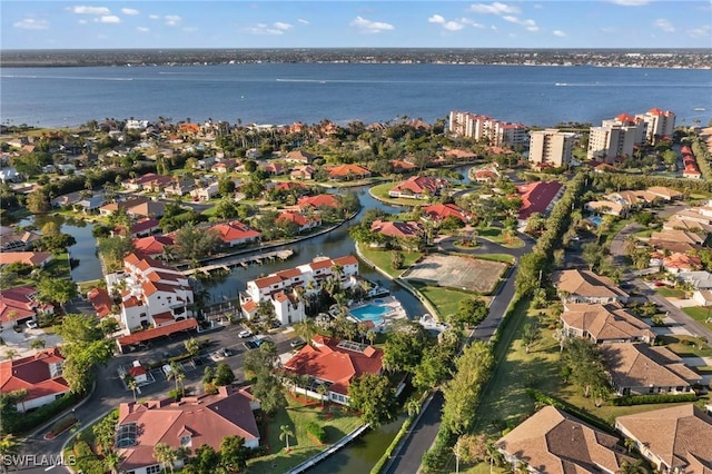 birds eye view of property featuring a water view