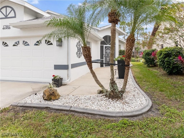 view of side of home with a garage