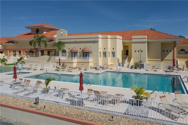 view of swimming pool with a patio area