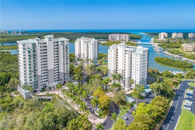 birds eye view of property featuring a water view