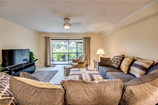 living room featuring ceiling fan and light tile patterned floors