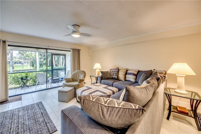 living room with ceiling fan and light tile patterned floors