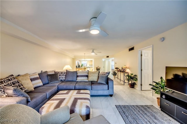 living room featuring ceiling fan