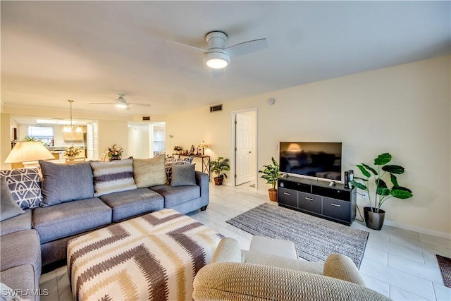 living room with ceiling fan