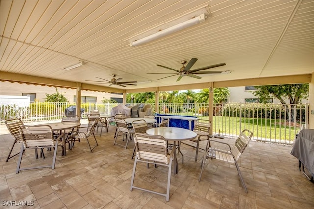 view of patio with ceiling fan