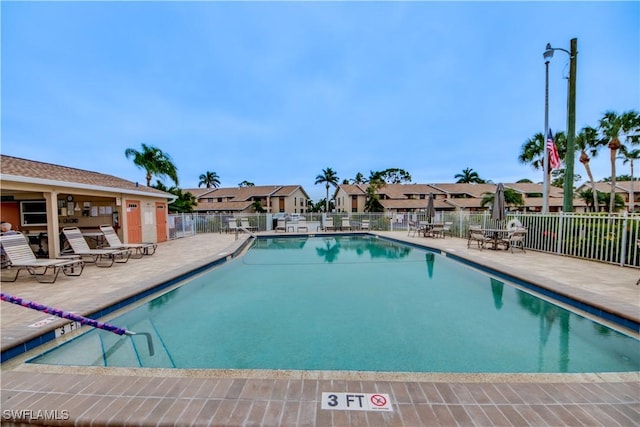 view of pool featuring a patio