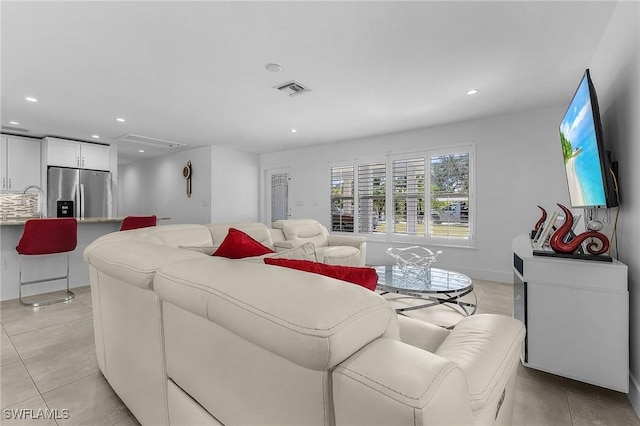 tiled living room with sink