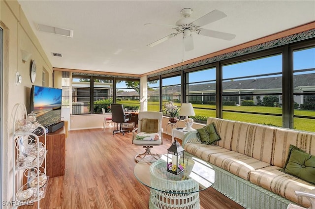 interior space featuring ceiling fan