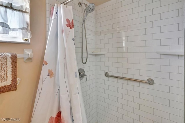 bathroom with a shower with curtain