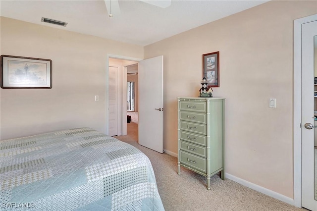 carpeted bedroom featuring ceiling fan