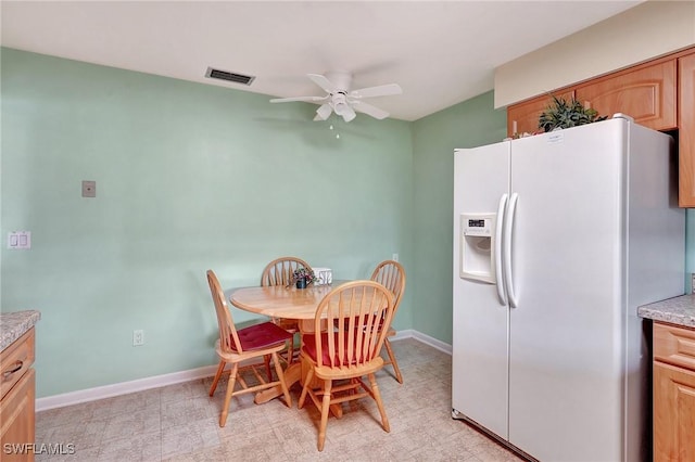 dining area featuring ceiling fan