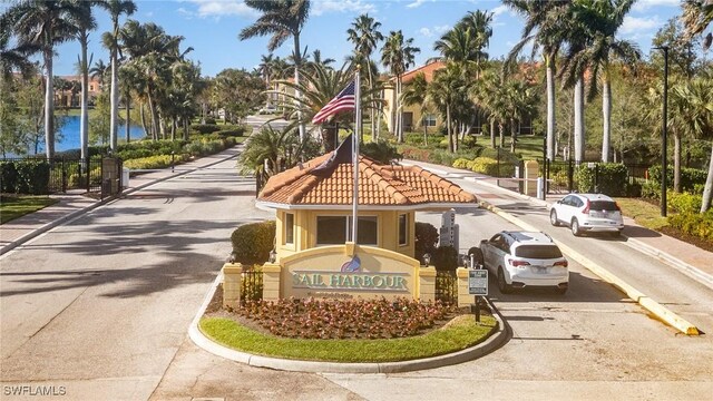 16129 Via Solera Cir Unit 102, Fort Myers, FL 33908 - view of community with driveway and a water view