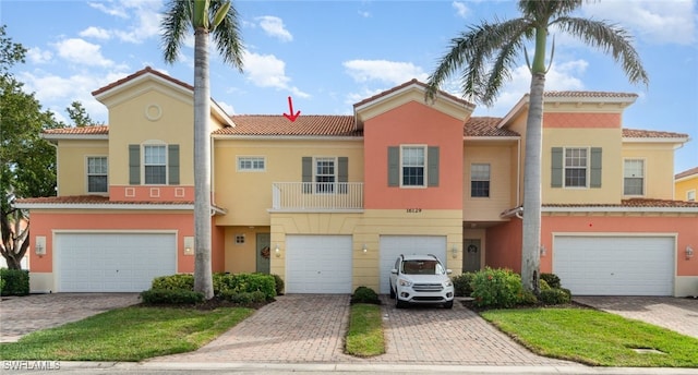 view of front of home with a garage