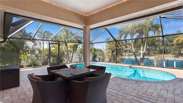 view of pool with a lanai and a patio