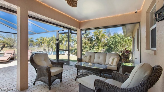 sunroom / solarium featuring plenty of natural light