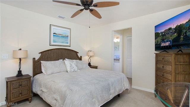 carpeted bedroom featuring ceiling fan