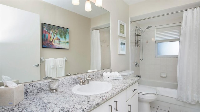 full bathroom with vanity, toilet, tile patterned flooring, and shower / tub combo