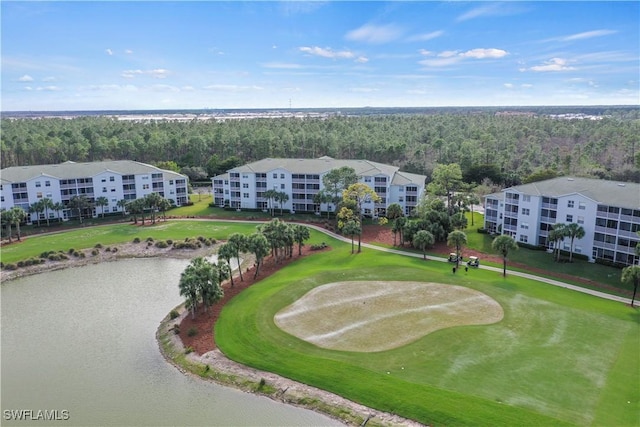 aerial view of a nearby body of water, a forest, a local golf course, and apartment complex