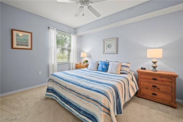 bedroom featuring carpet floors, baseboards, and ceiling fan