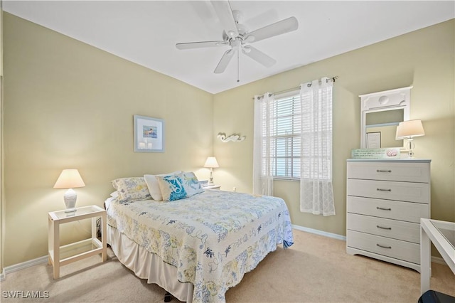 bedroom with carpet flooring, baseboards, and ceiling fan