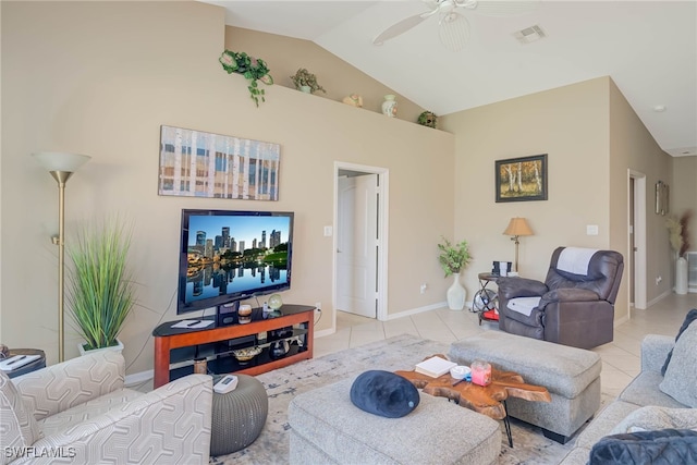 living room with light tile patterned flooring, ceiling fan, and vaulted ceiling