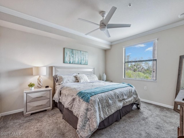 bedroom with ceiling fan, ornamental molding, and light carpet