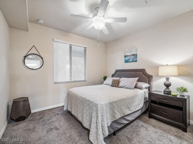 bedroom with ceiling fan and light colored carpet